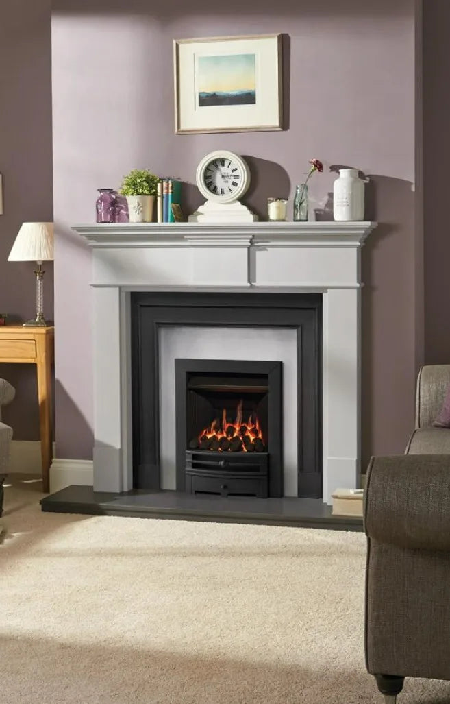 Logic Convector conventional flue fire with Matt Black Chartwell front. Shown with Grey Pembroke wooden mantel with Belgravia Matt Black Cast Front and Polished Insert Panel.