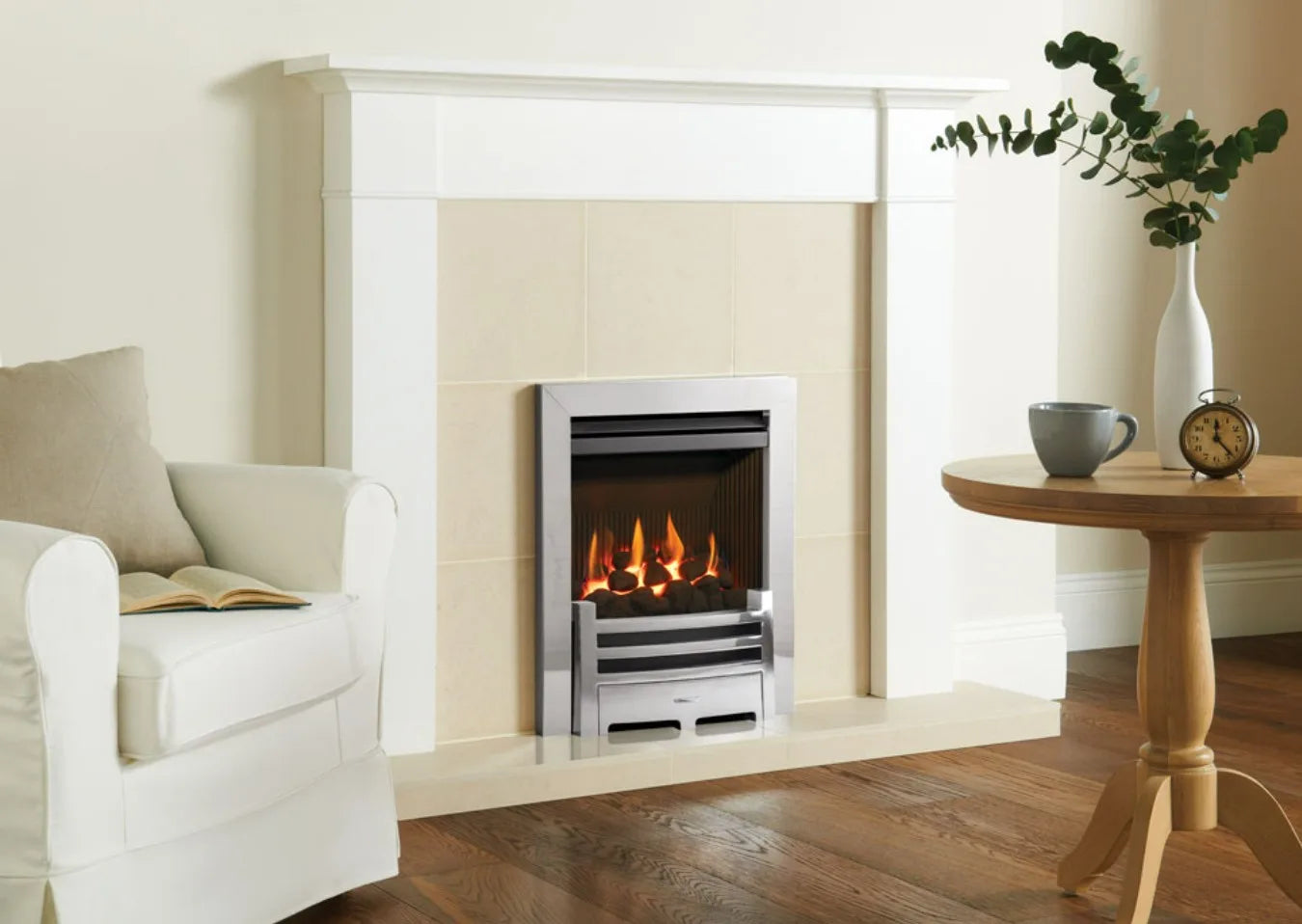 Logic HE balanced flue fire with coal-effect and Polished Chrome-effect Arts front. Shown with white Brompton wooden mantel.
