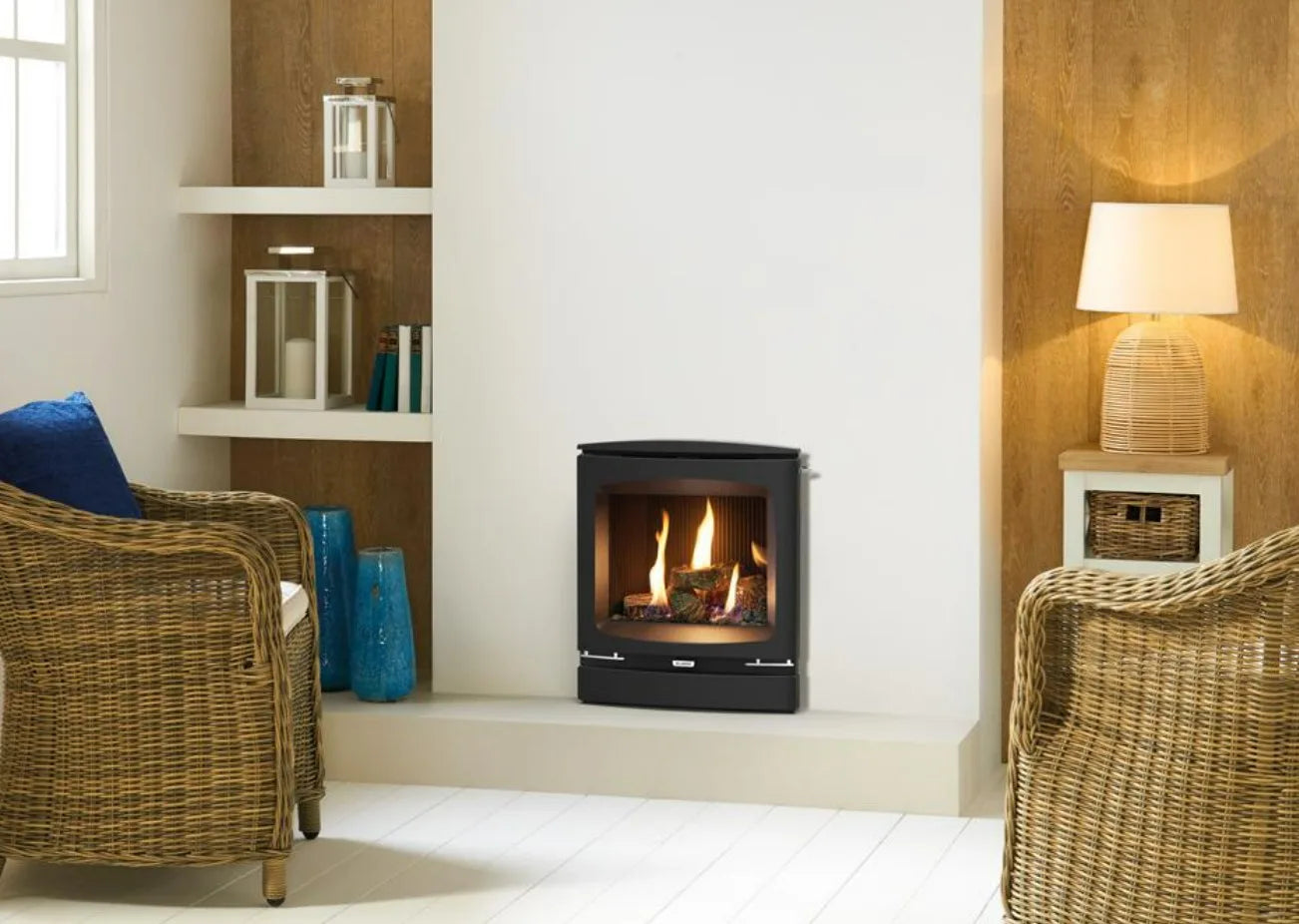Logic HE conventional flue fire (Slide control) with log-effect and Vogue Inset front.