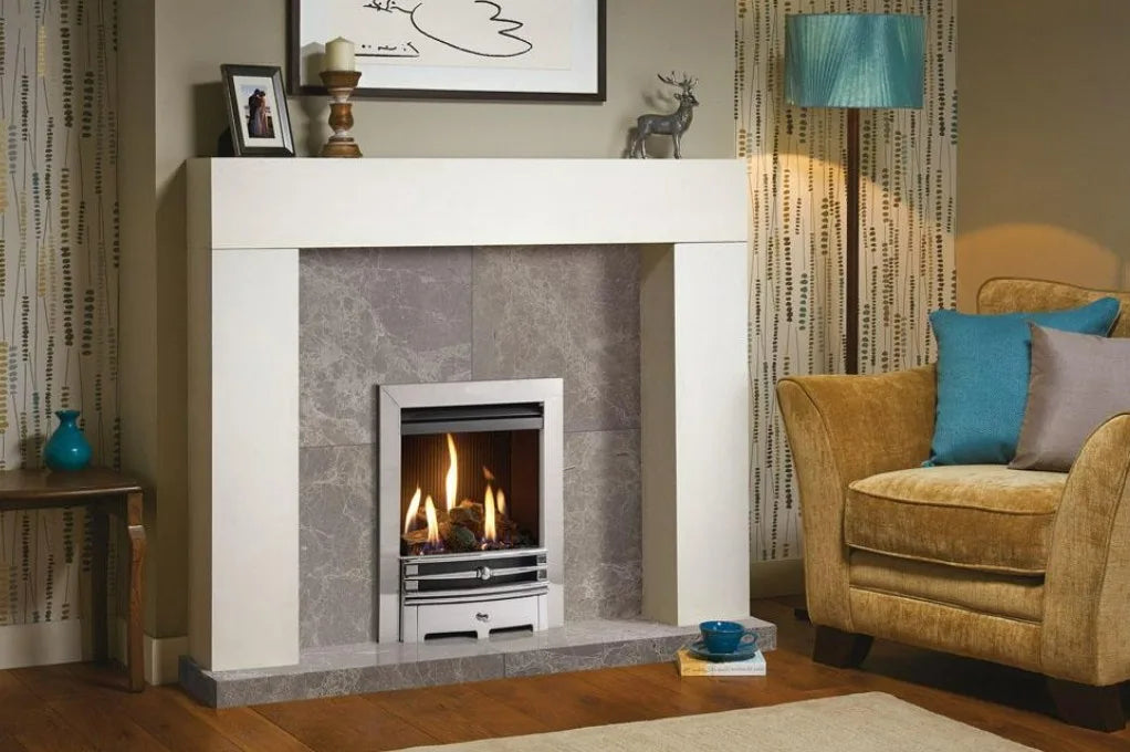 Logic HE conventional flue fire with log-effect and Polished Chrome-effect Chartwell front. Shown with white Malmo wooden mantel - available to UK mainland only.