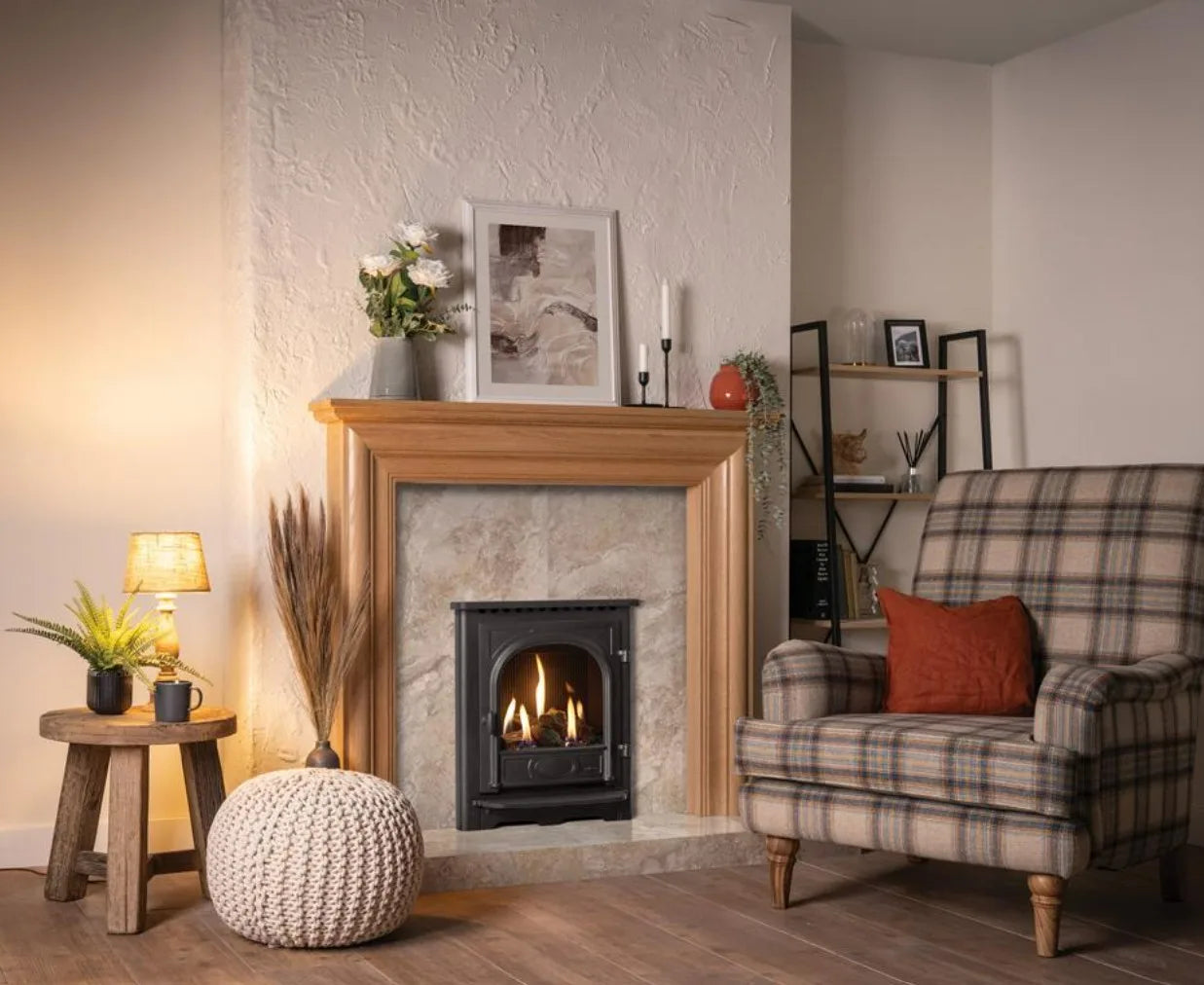 Logic HE conventional flue fire with log-effect and Stockton Inset front.